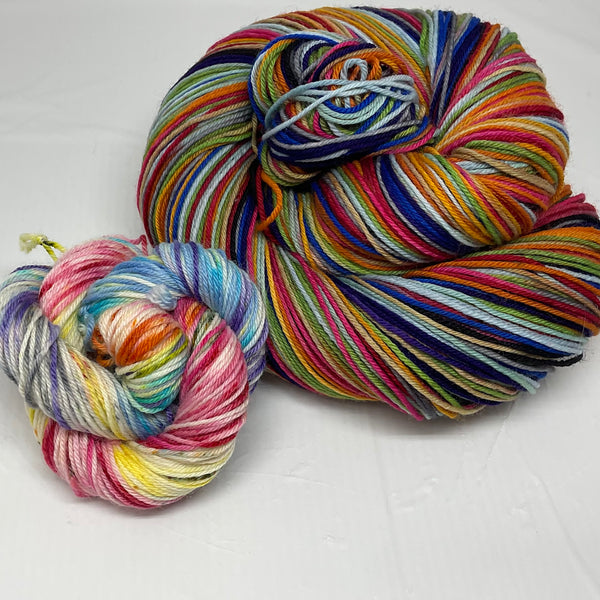 Rainbow Pantsuits Twelve Stripe Self Striping Yarn with Coordinating Speckled Mini Skein