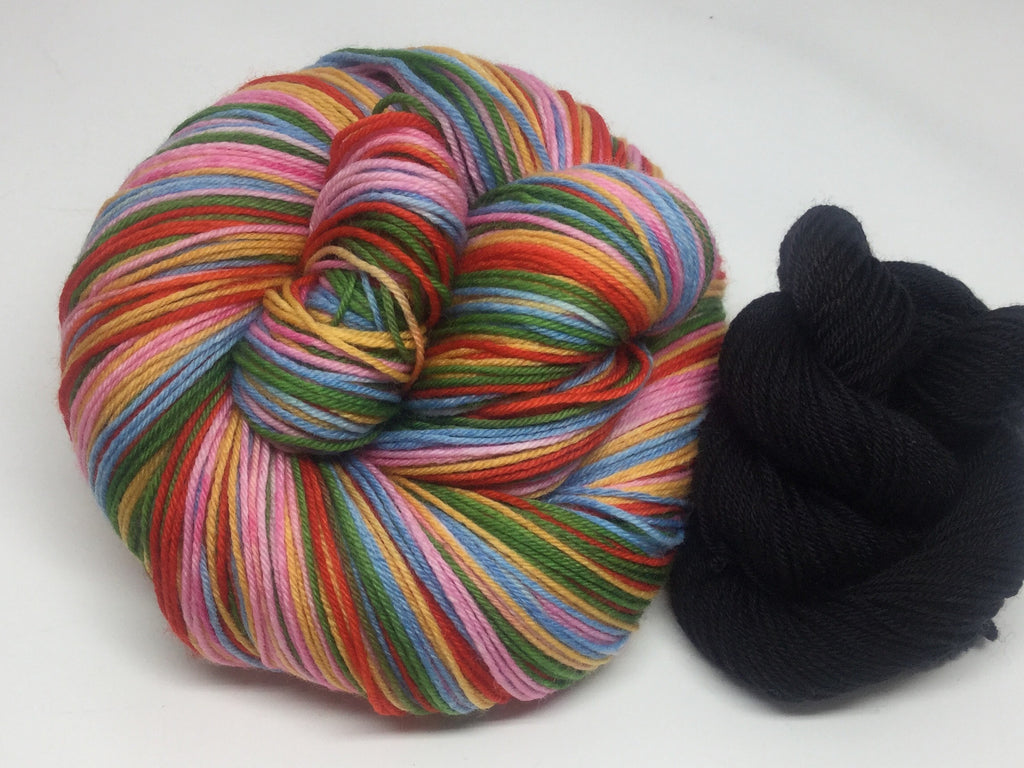 Laugh-In Five Stripe Self Striping Yarn with Black Mini Skein